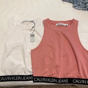2 Calvin Klein cropped tops
